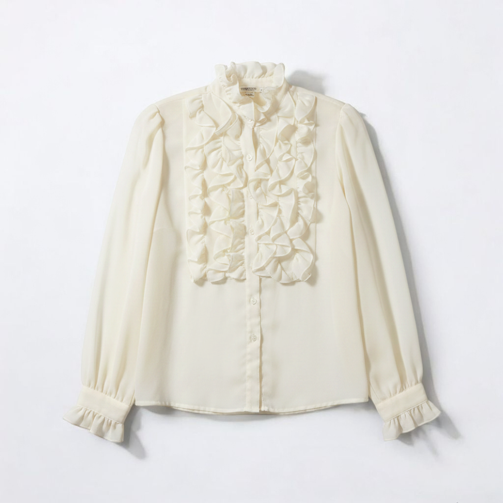 Vintage ivory ruffle blouse with long sleeves and button front front on white muslin photography backdrop