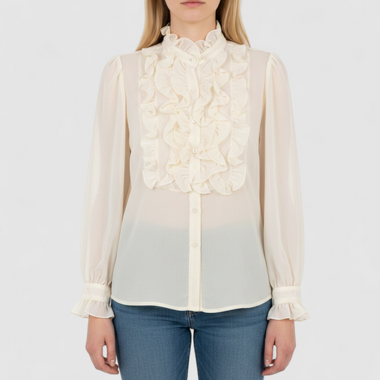 Vintage ivory ruffle blouse with long sleeves and button front on model