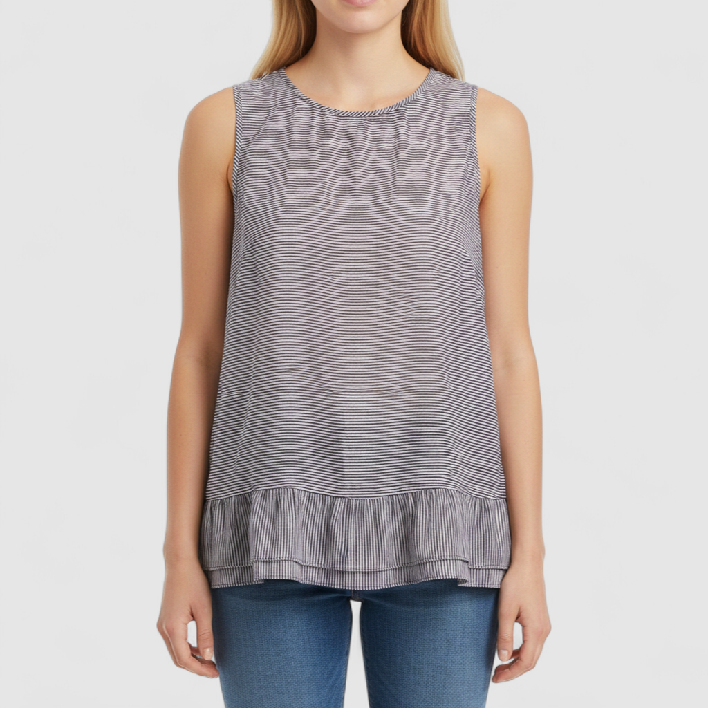 Elle black and white striped sleeveless tank top with peplum hem on clear hanger on model