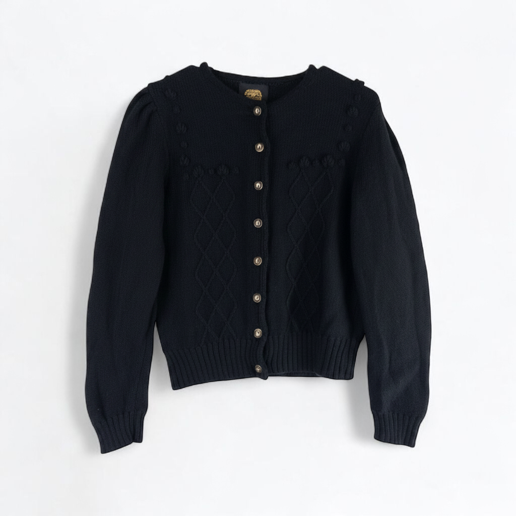 Lanamoden Salzburg chunky black knit wool cardigan sweater for women front and back views with button details and knit texture close-ups front on white muslin photography backdrop