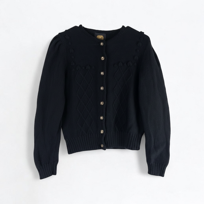 Lanamoden Salzburg chunky black knit wool cardigan sweater for women front and back views with button details and knit texture close-ups front on white muslin photography backdrop
