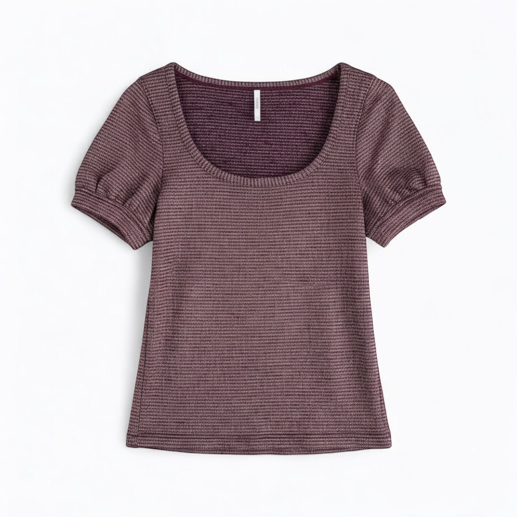 Free People knit purple and gold short puff sleeve sweater top on hanger against white background front on white muslin photography backdrop