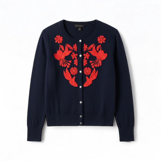 J Crew navy blue cardigan sweater with red embroidered floral design on front, button closure, long sleeves, and crew neck. front on white muslin photography backdrop