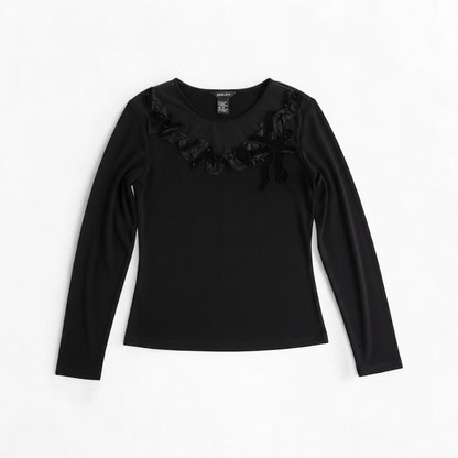 Beliza black velvet womens medium top with long sleeves and decorative velvet ribbon and bead trim at neckline on white hanger front on white muslin photography backdrop