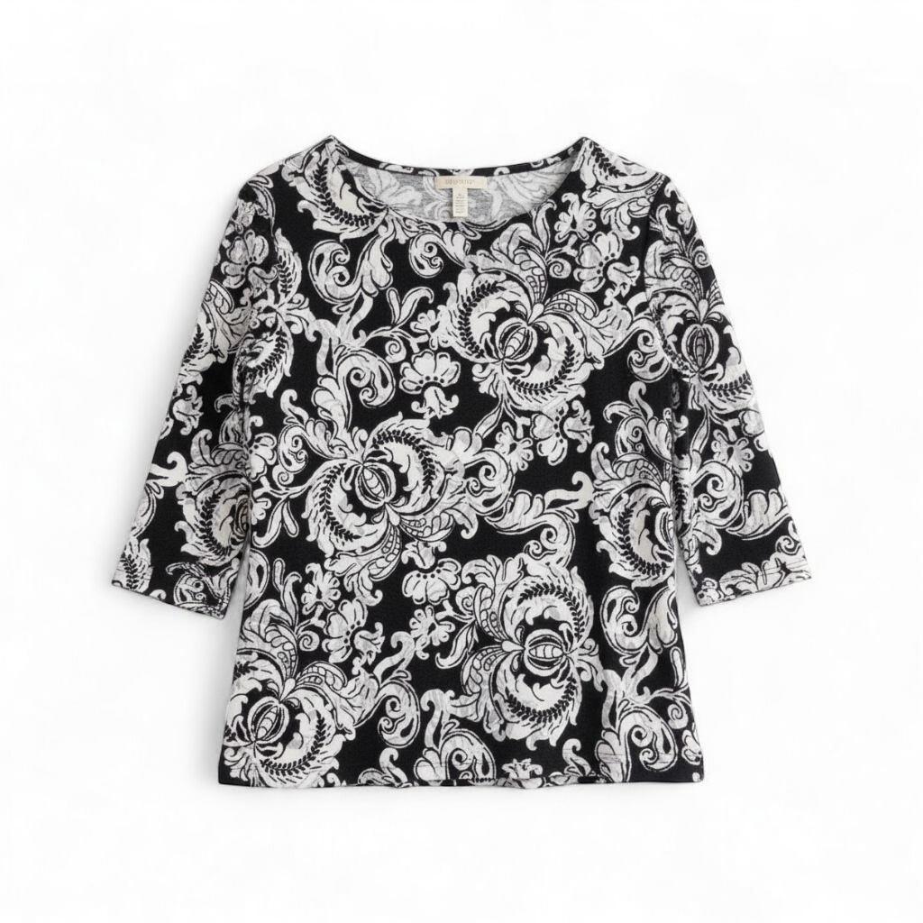 JM Collection black and white floral blouse top with 3/4 sleeves and crew neck, women's medium petite size front on white muslin photography backdrop