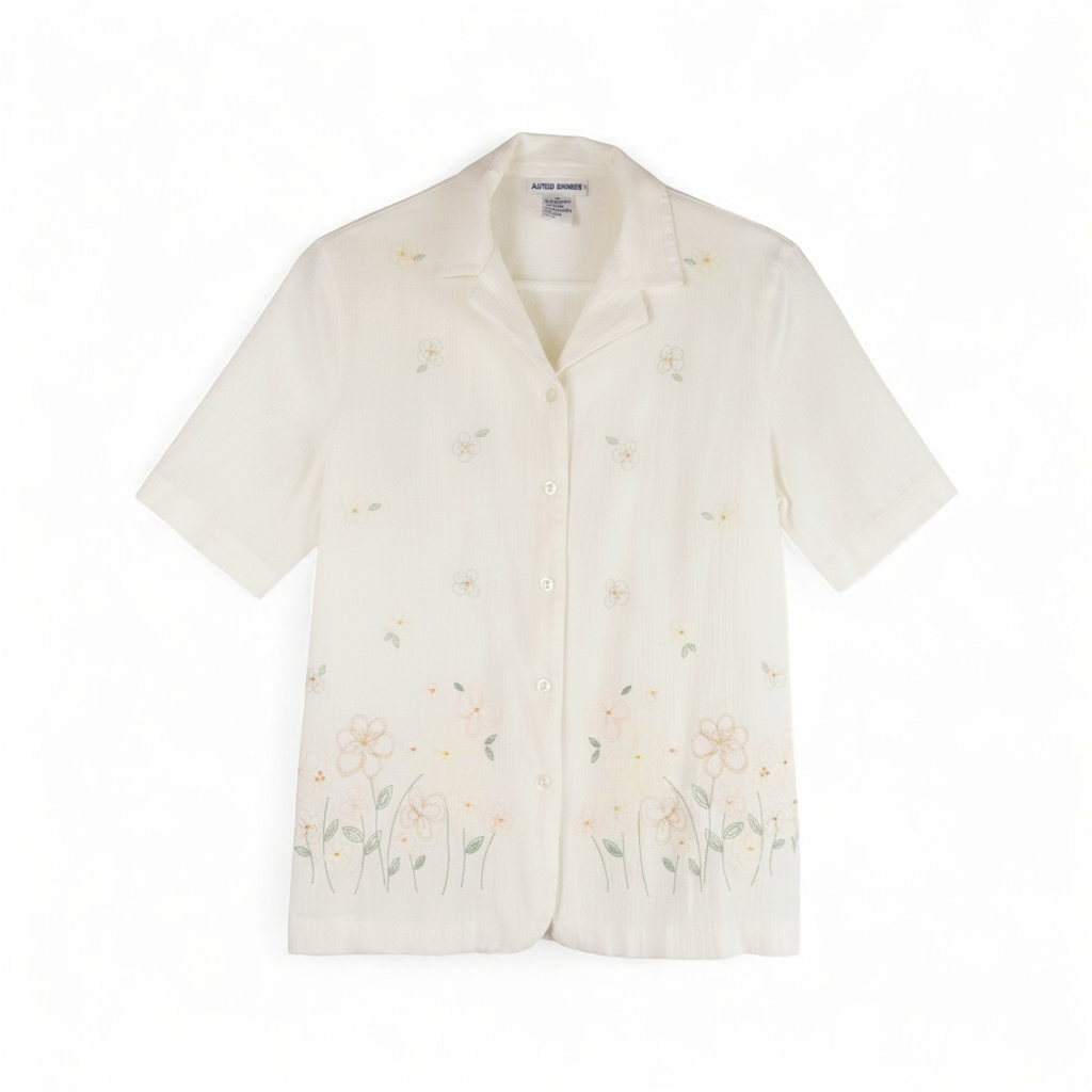 Alfred Dunner vintage white beaded floral shirt with short sleeves and button front closure front on white muslin photography backdrop