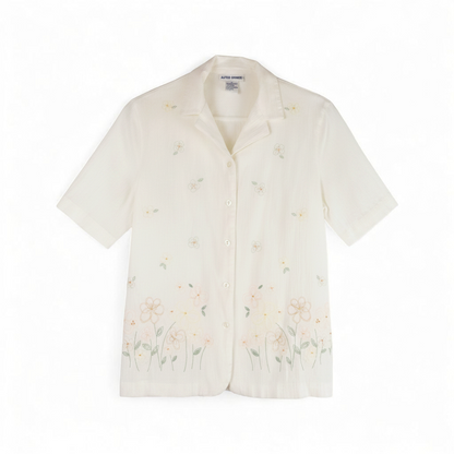 Alfred Dunner vintage white beaded floral shirt with short sleeves and button front closure front on white muslin photography backdrop