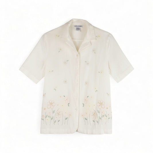 Alfred Dunner vintage white beaded floral shirt with short sleeves and button front closure front on white muslin photography backdrop