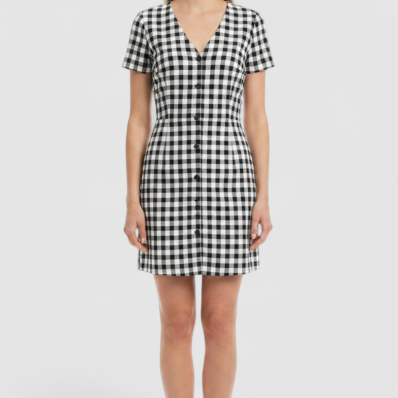 Shein black and white checkered tunic mini dress with button front and short sleeves on model