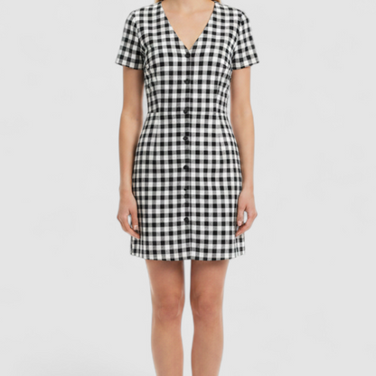 Shein black and white checkered tunic mini dress with button front and short sleeves on model