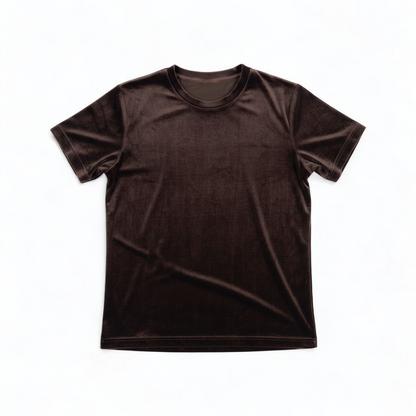 Williwear vintage brown velvet top with short sleeves and crew neckline hanging on a hanger front on white muslin photography backdrop