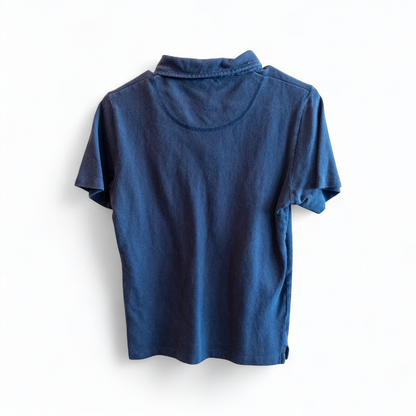 Blue Sunspel cotton polo shirt with short sleeves and chest pocket hanging on white hanger image 5