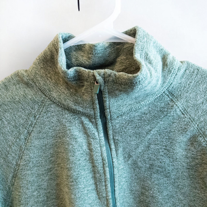 Eddie Bauer green quarter zip sweatshirt hanging on a plastic hanger showing front, back, collar, and inside label image 2