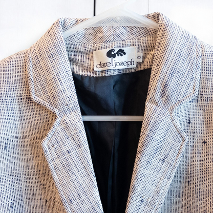 Clare Joseph vintage blue and white raw silk blazer with padded shoulders and two button closure hanging on hanger image 2