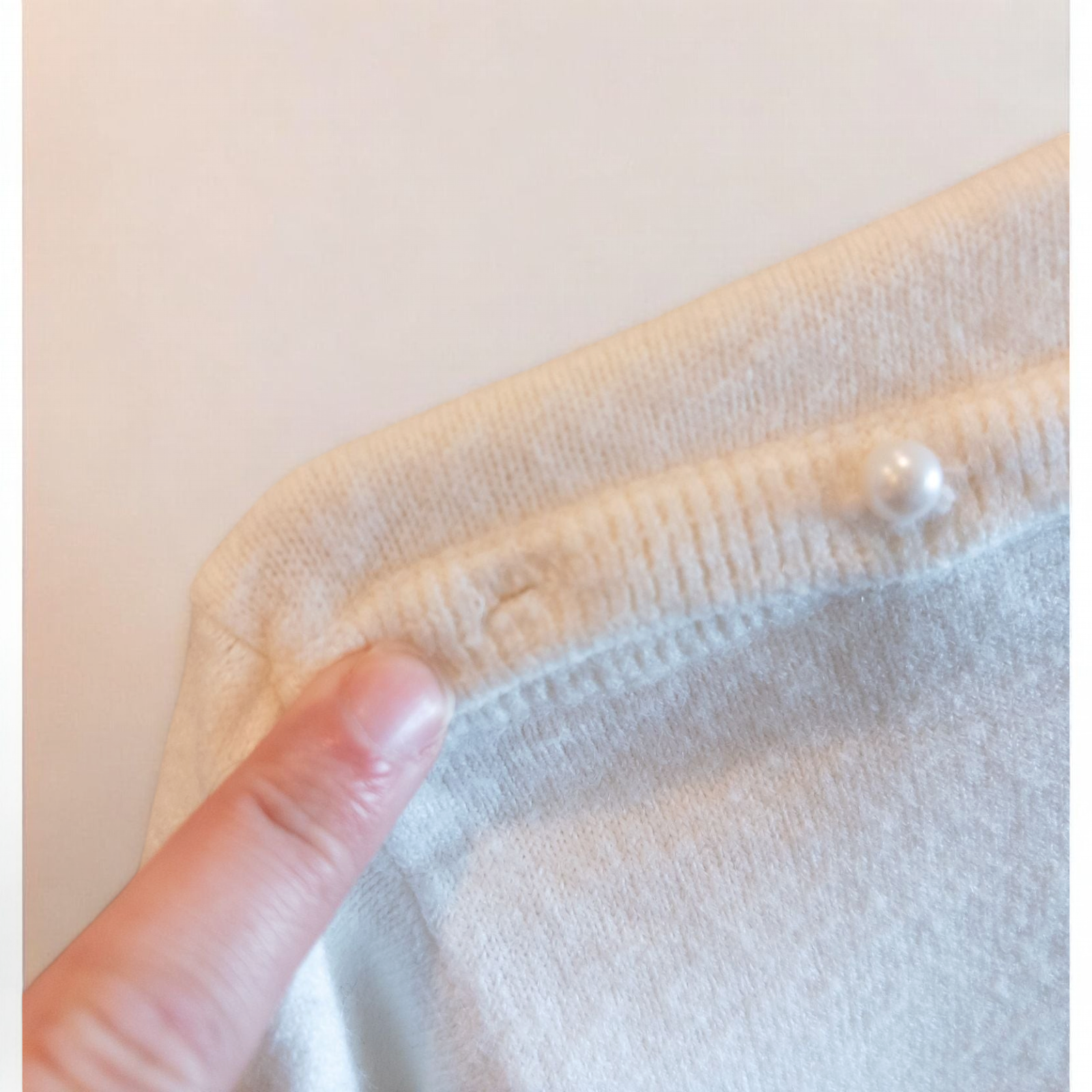 Designers Originals white women’s medium turtleneck sweater with pearl buttons on shoulder hanging on hanger image 5