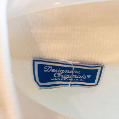 Designers Originals white women’s medium turtleneck sweater with pearl buttons on shoulder hanging on hanger image 6