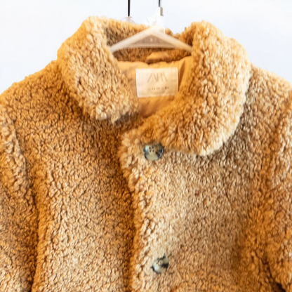 Zara brown teddy bear coat kids size 13 14 hanging on wall, showing front, back, inside lining and close up details of pockets and buttons image 2