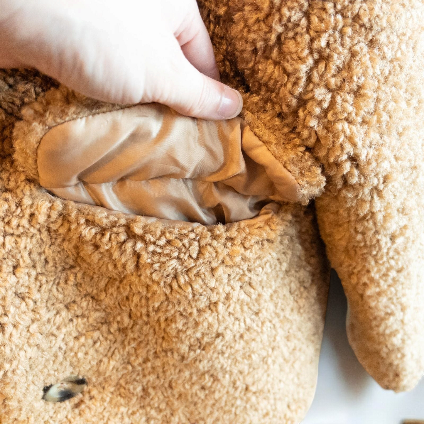 Zara brown teddy bear coat kids size 13 14 hanging on wall, showing front, back, inside lining and close up details of pockets and buttons image 4