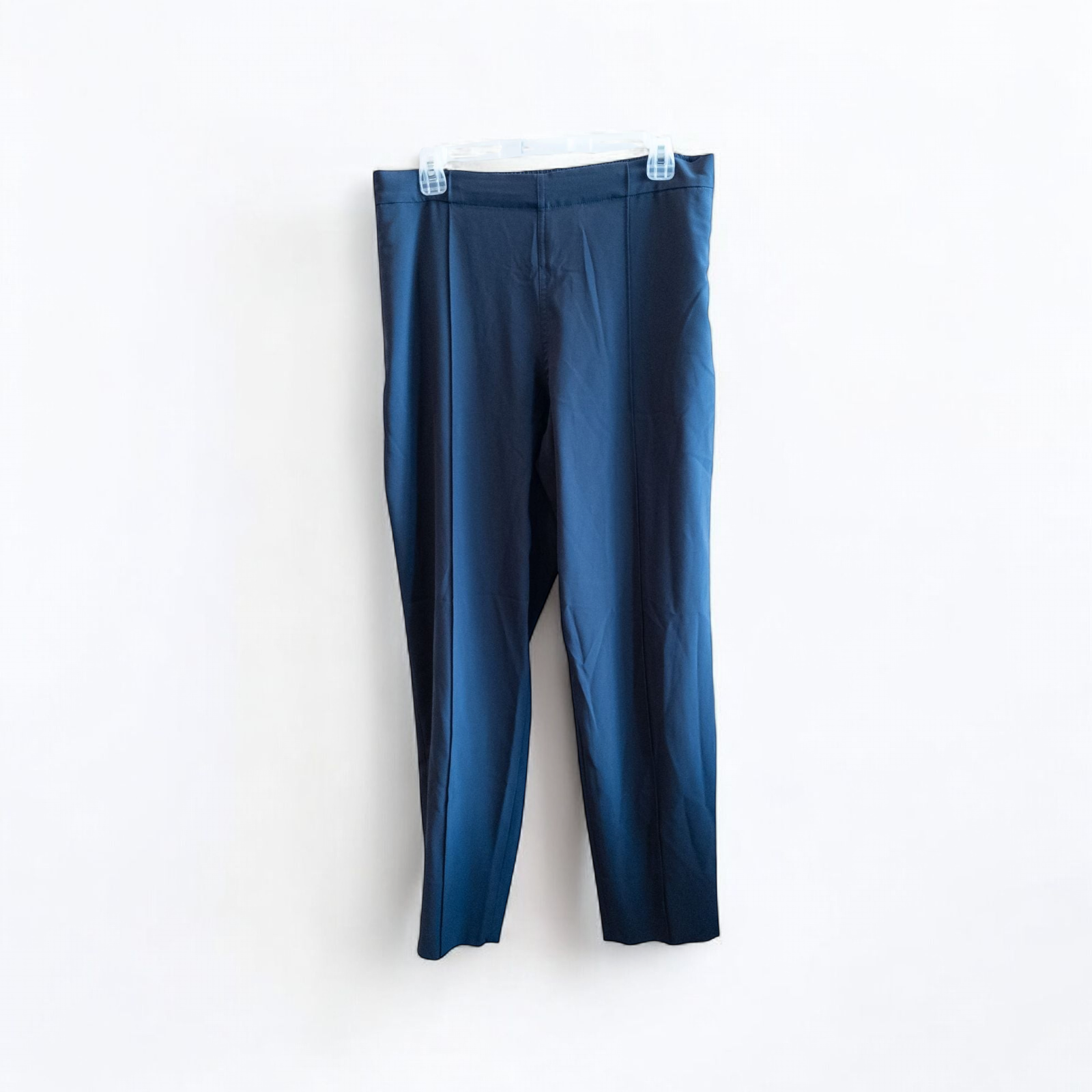 Gray MM LaFleur tech pants hanging on a hanger front and back views with close up of waistband, zipper, and label