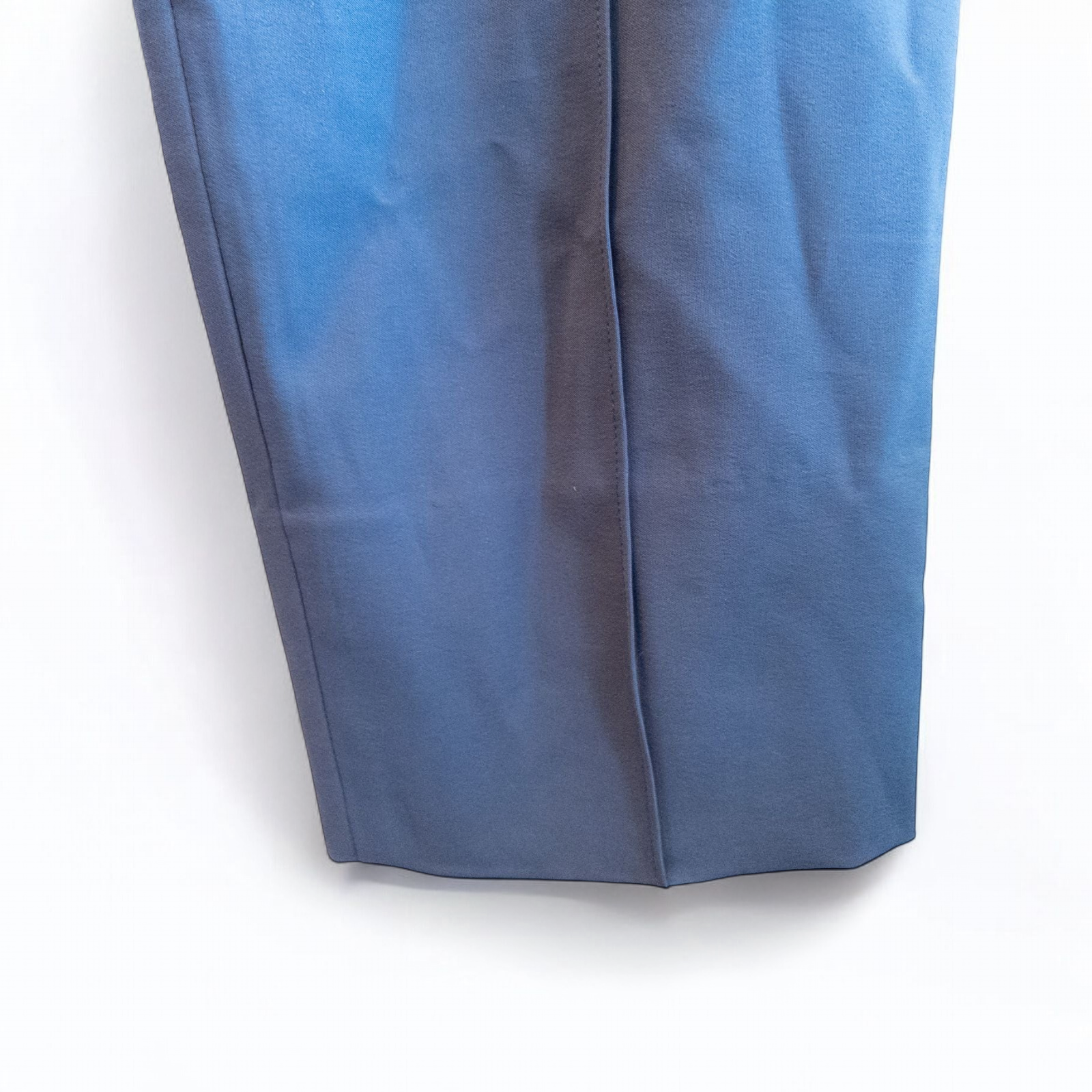 Gray MM LaFleur tech pants hanging on a hanger front and back views with close up of waistband, zipper, and label image 5