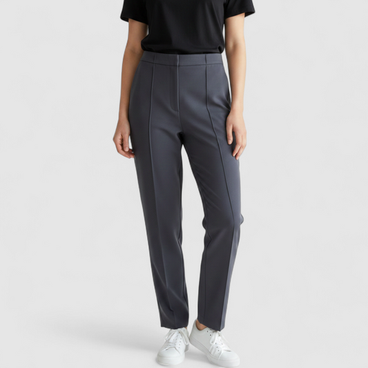 Gray MM LaFleur tech pants hanging on a hanger front and back views with close up of waistband, zipper, and label on model