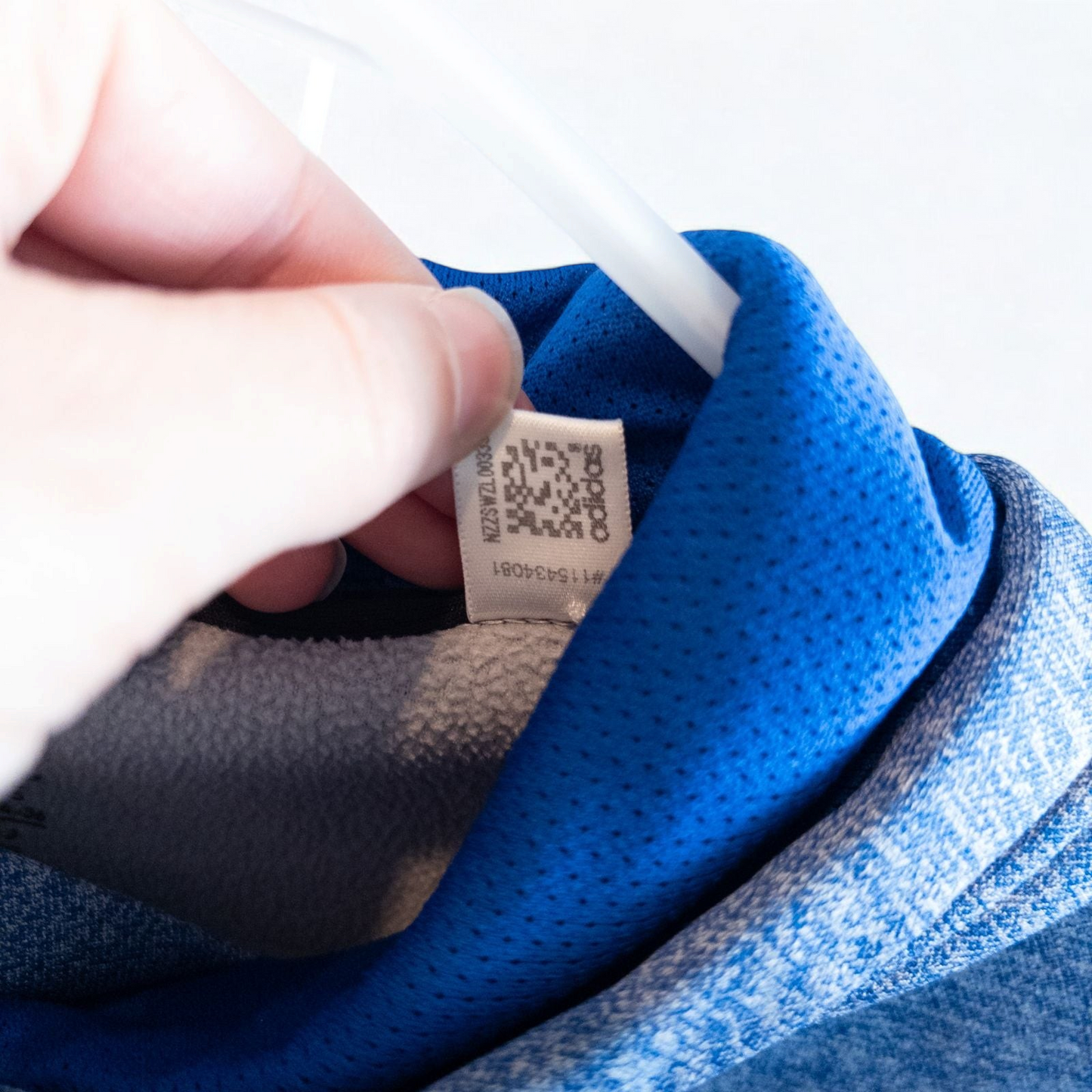 Adidas Climawarm blue heathered fleece pullover hoodie with kangaroo pocket and thumbhole cuffs shown front and back image 10