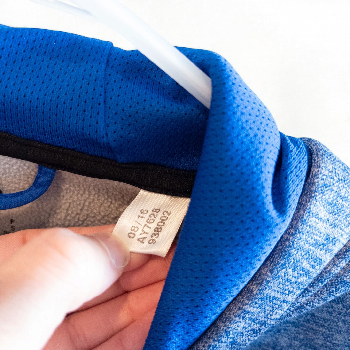 Adidas Climawarm blue heathered fleece pullover hoodie with kangaroo pocket and thumbhole cuffs shown front and back image 9