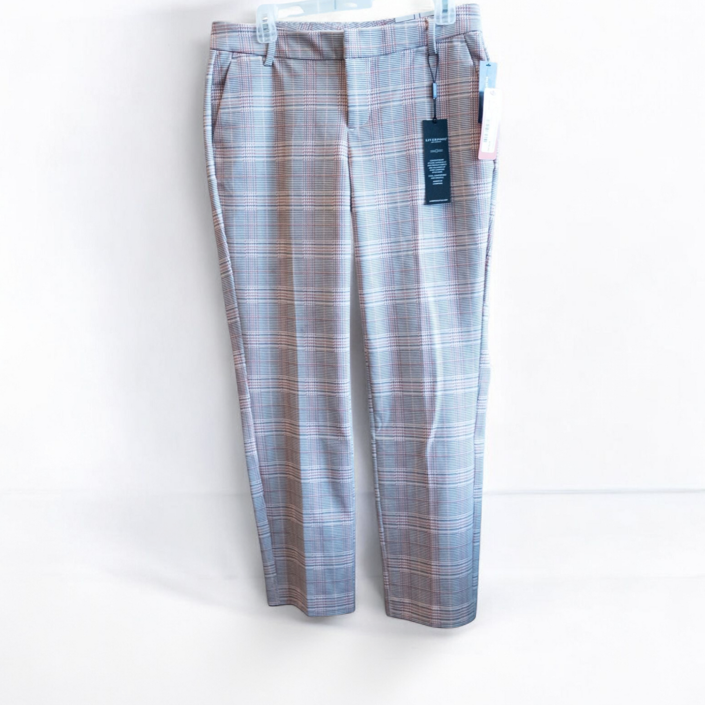 Liverpool Kelsey Lava Flow orange plaid straight leg trousers with tags hanging on white cabinet