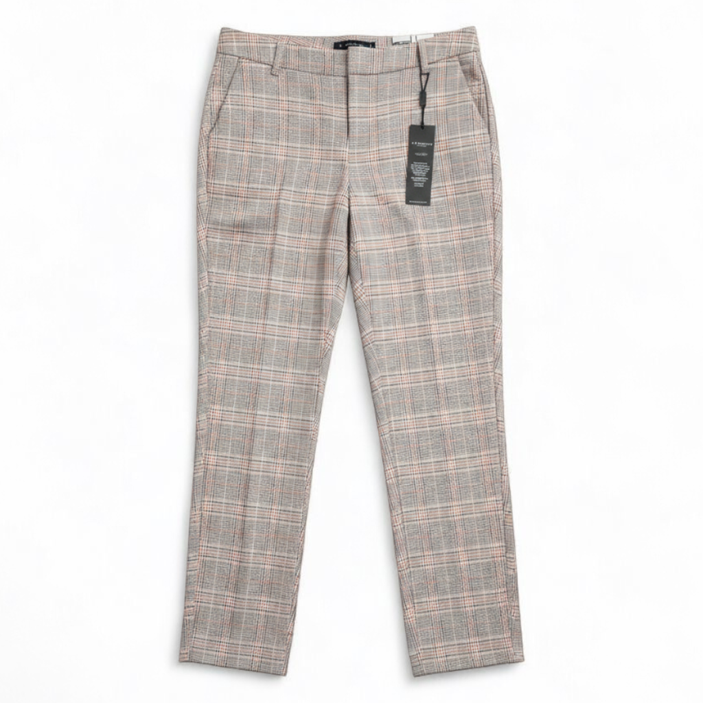 Liverpool Kelsey Lava Flow orange plaid straight leg trousers with tags hanging on white cabinet front on white muslin photography backdrop