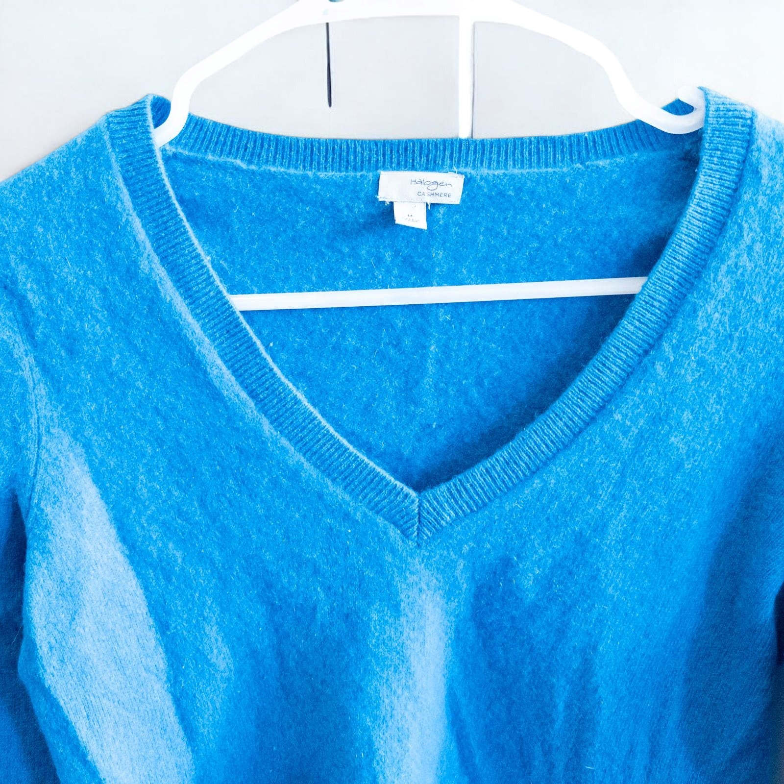 Halogen bright blue v neck cashmere sweater womens medium displayed on hanger image 2