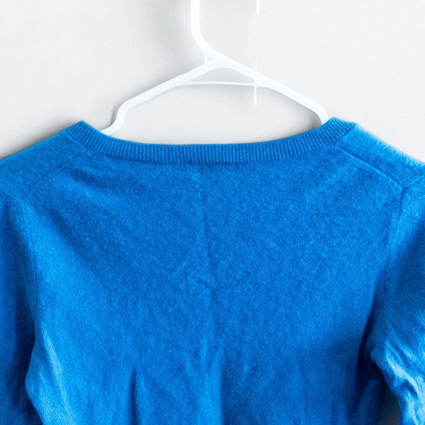 Halogen bright blue v neck cashmere sweater womens medium displayed on hanger image 6