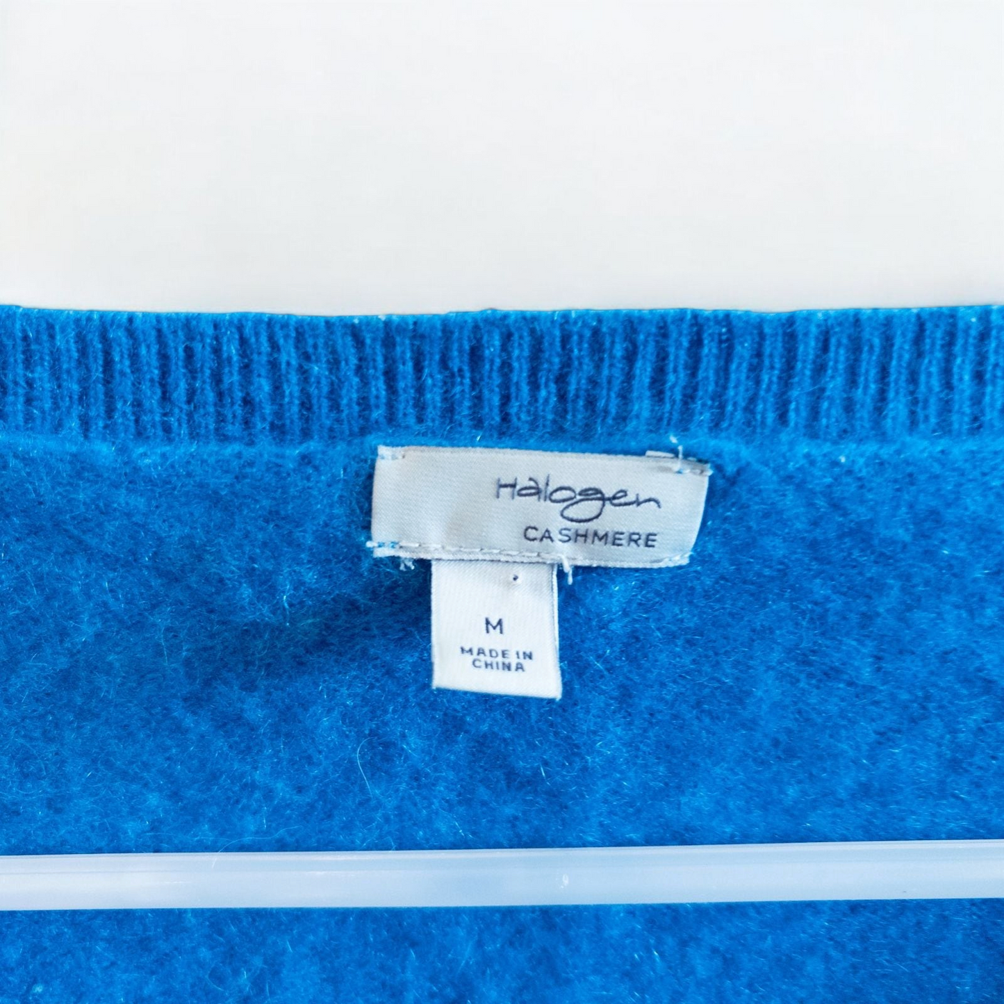Halogen bright blue v neck cashmere sweater womens medium displayed on hanger image 7