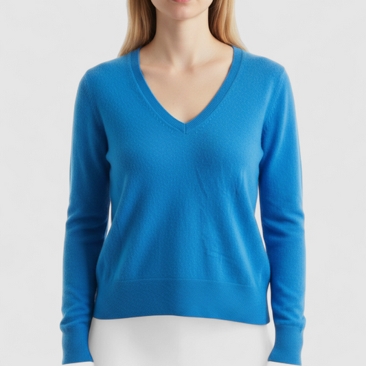 Halogen bright blue v neck cashmere sweater womens medium displayed on hanger on model