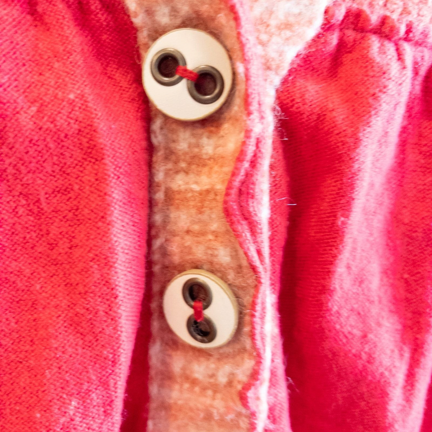 Free People red wool knit cardigan sweater with hood and button front, hung on white hanger image 4