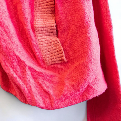 Free People red wool knit cardigan sweater with hood and button front, hung on white hanger image 5