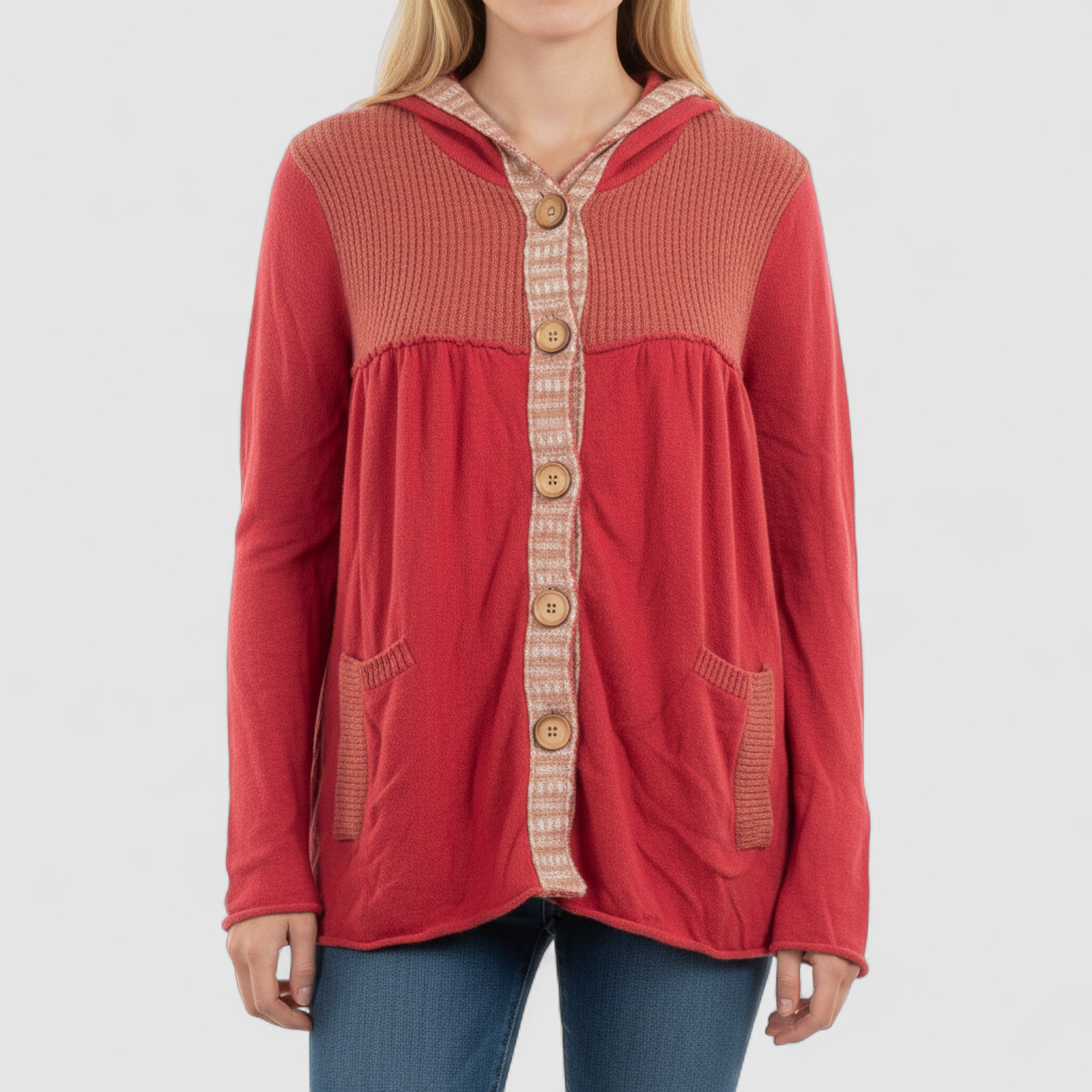 Free People red wool knit cardigan sweater with hood and button front, hung on white hanger on model