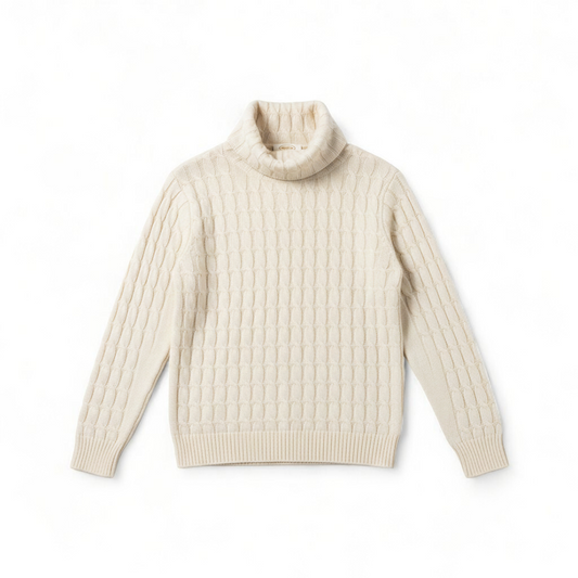 Tan cable knit Talbots turtleneck sweater with silk cashmere blend hanging on a white hanger front on white muslin photography backdrop