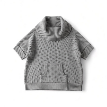 BCBGMaxazria gray dusk open knit cowl neck sweater with short sleeves and front pouch pocket front on white muslin photography backdrop