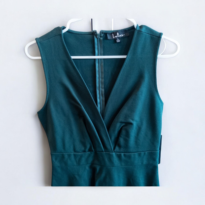 Lulus green sleeveless mini dress with deep v-neck and back zipper hanging on white hanger image 2