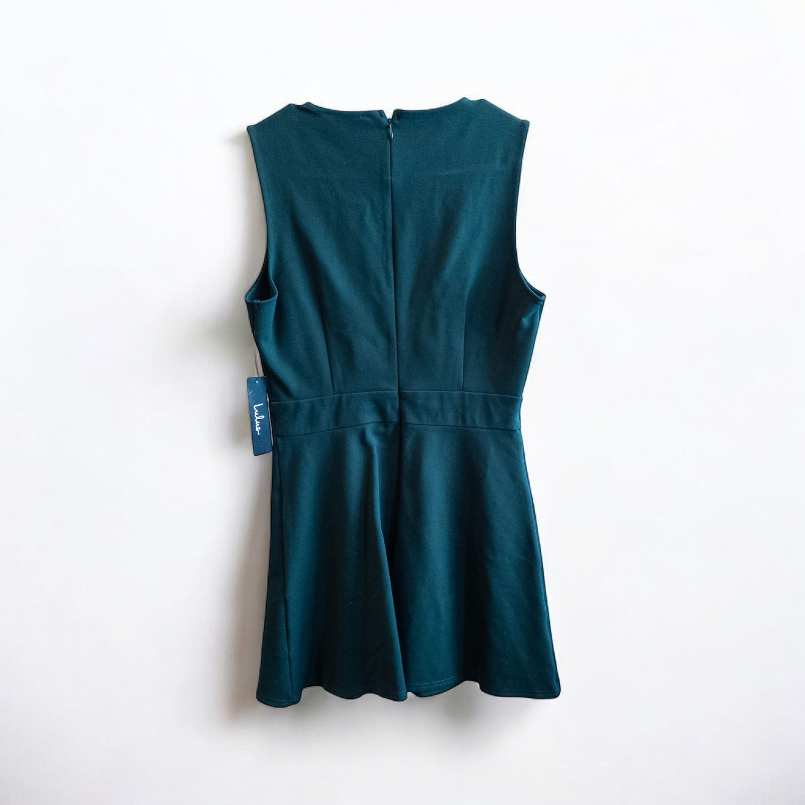 Lulus green sleeveless mini dress with deep v-neck and back zipper hanging on white hanger image 3