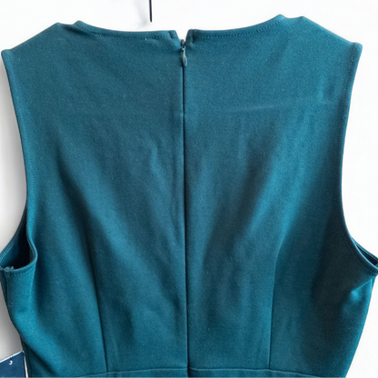Lulus green sleeveless mini dress with deep v-neck and back zipper hanging on white hanger image 4