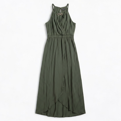 Luxology green slit maxi dress hanging on a hanger in front of a mirror front on white muslin photography backdrop