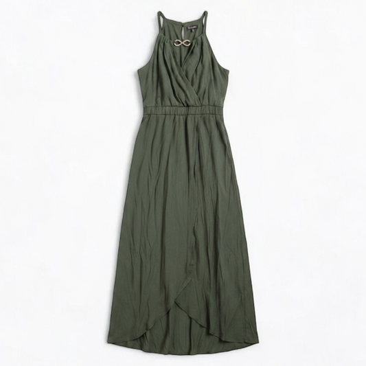 Luxology green slit maxi dress hanging on a hanger in front of a mirror front on white muslin photography backdrop