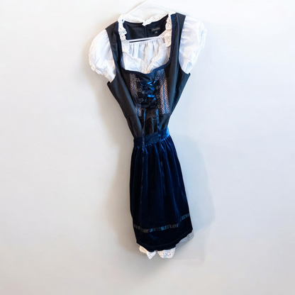 Glorystar vintage German Oktoberfest costume black dress with lace blouse and blue apron set hanging on white door
