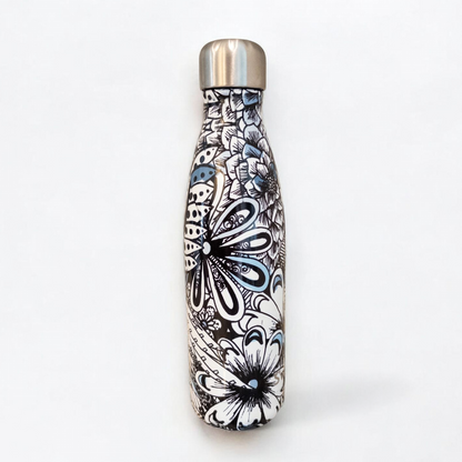 Starbucks Swizzle bottle with black white and blue artistic floral abstract print on countertop image 3