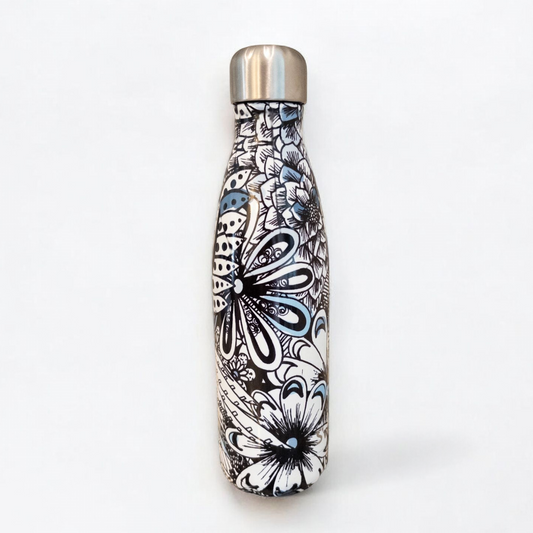 Starbucks Swizzle bottle with black white and blue artistic floral abstract print on countertop image 3