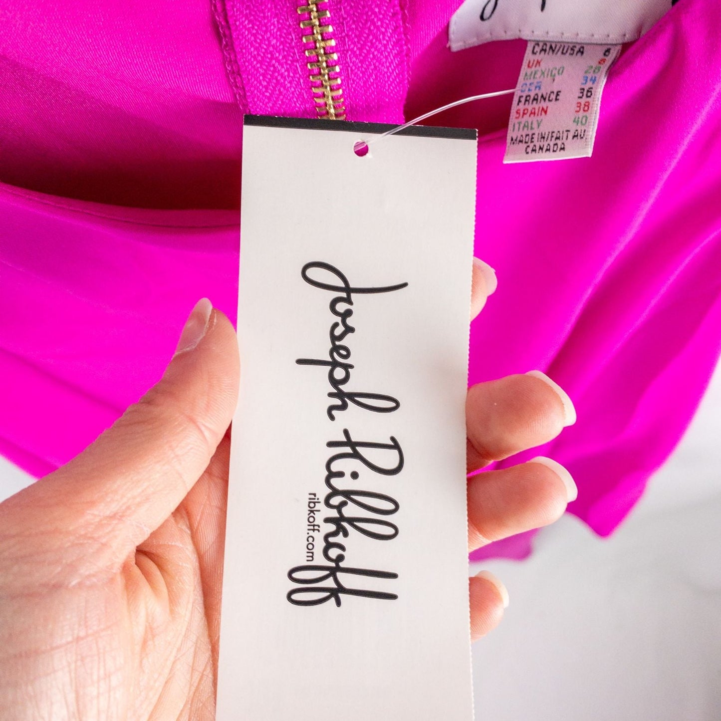 Joseph Ribkoff pink sleeveless dress with asymmetrical layered detail and back zipper on hanger image 13