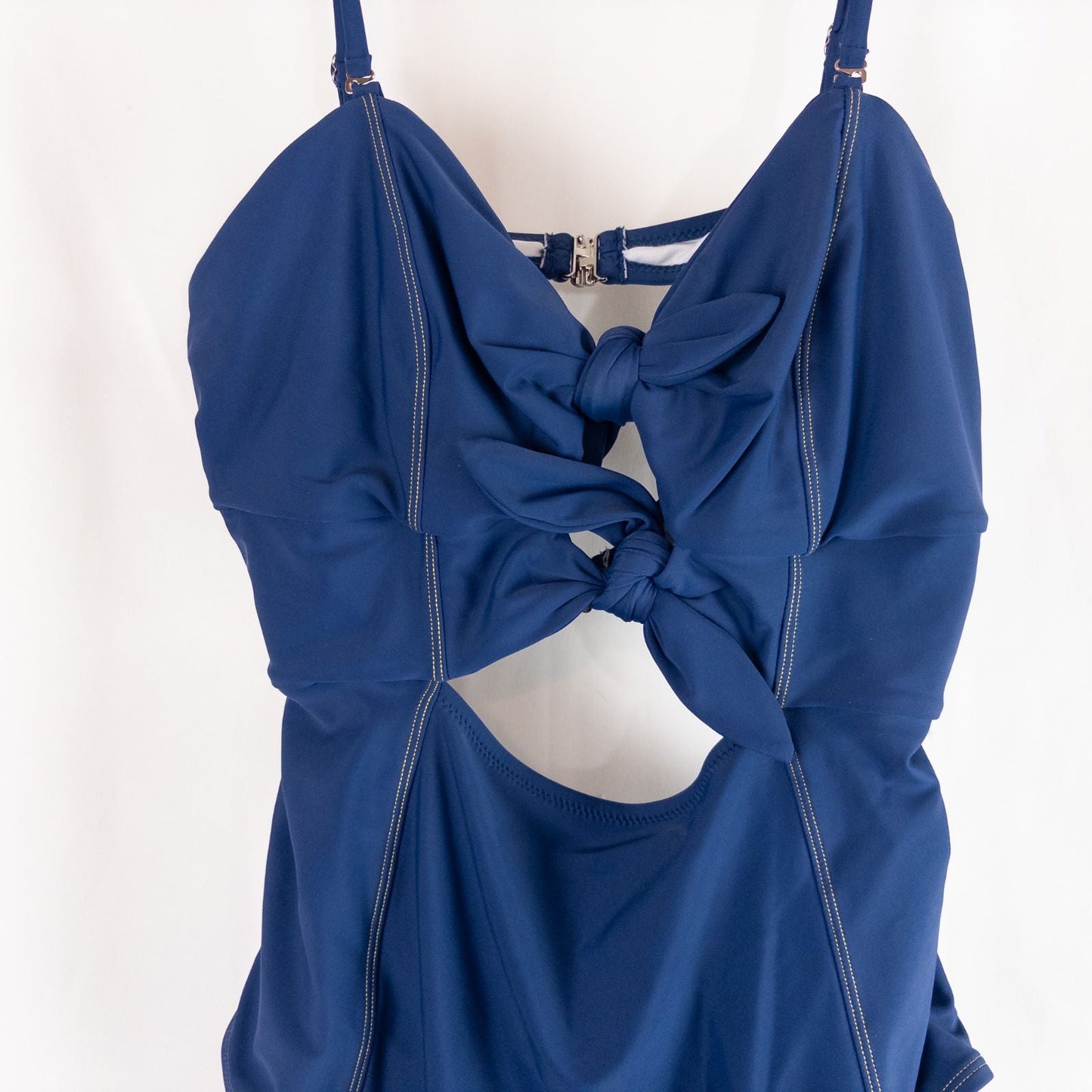 Blue Cupshe one piece swimsuit with cutout and knot detailing front view on hanger image 2