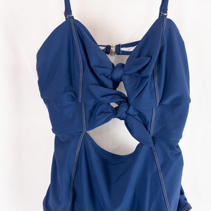 Blue Cupshe one piece swimsuit with cutout and knot detailing front view on hanger image 2