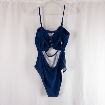 Blue Cupshe one piece swimsuit with cutout and knot detailing front view on hanger image 5